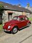 1959 Garnet Red Euro Ragtop / Sunroof beetle.